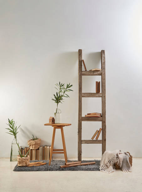 istock modern home living room white wall with wooden stool 1306670477