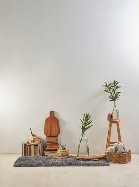 istock modern home living room white wall with wooden stool 1306670797