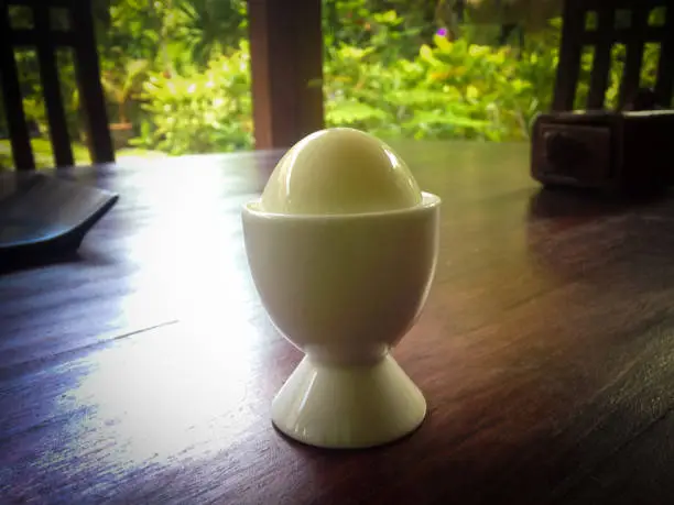 Perfect Soft Boiled Egg In A Egg Cup Glass Bowl On The Wooden Table