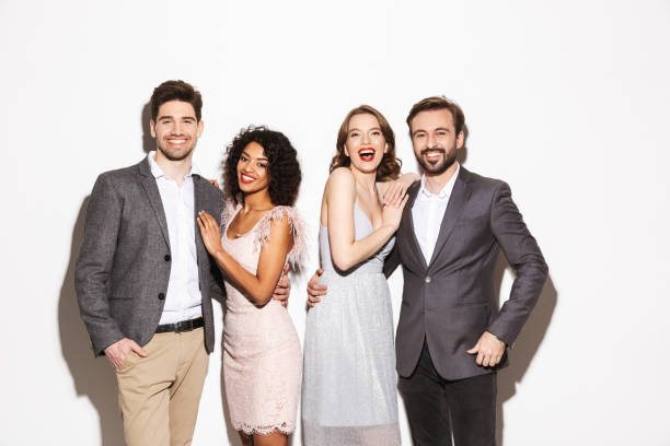istock Group of well dressed multiracial people standing together 1306671977