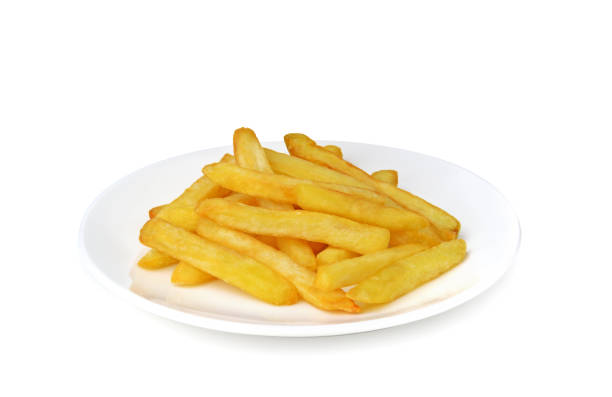 istock French fries in white plate isolated on white 1306679165