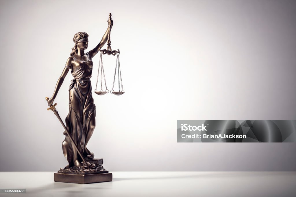 Legal and law concept statue of Lady Justice with scales of justice background Legal law concept statue of Lady Justice with scales of justice background Law Stock Photo