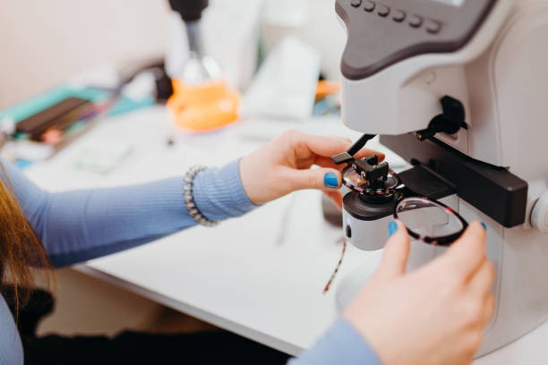 istock Female patient checking vision in ophthalmological clinic 1306680383