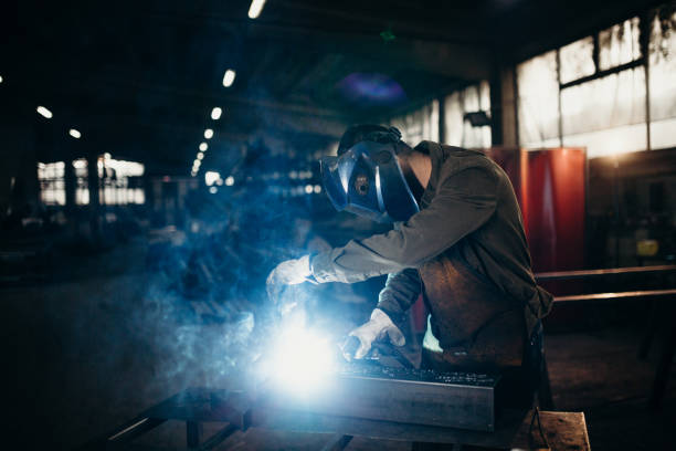 istock Welder working in a factory 1306680702