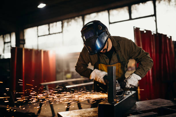 istock Welder working in a factory 1306680854