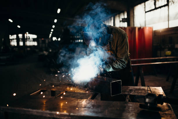 istock Welder working in a factory 1306680882