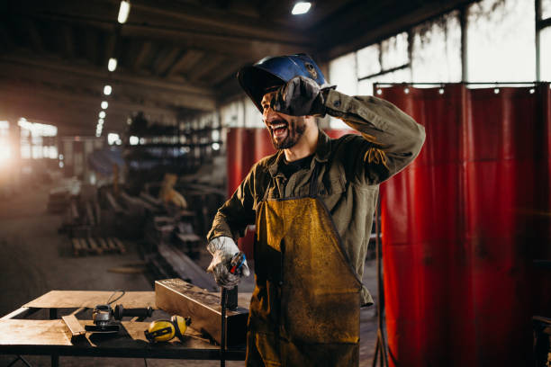 istock Welder working in a factory 1306680901