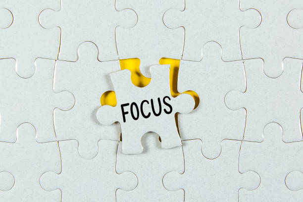 istock Focus text on a Jigsaw Puzzle - business concept 1306680919