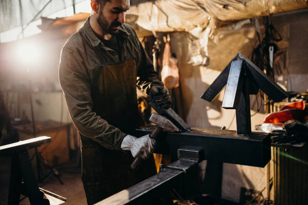 istock Welder working in a factory 1306680960
