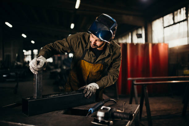 istock Welder working in a factory 1306681004