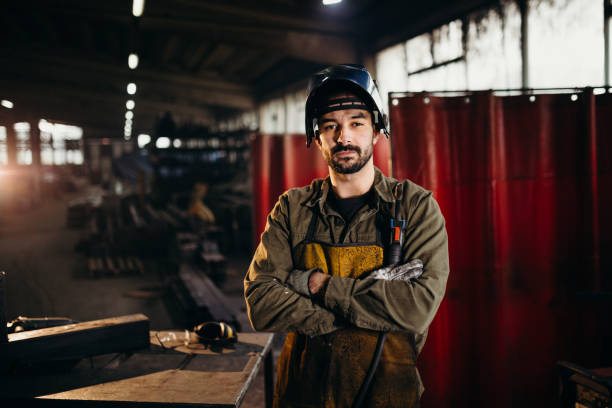 istock Welder working in a factory 1306681016