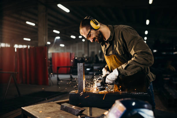 istock Welder working in a factory 1306681579