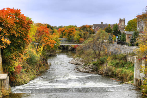 Grand River at Fergus, Ontario, Canada in Autumn The Grand River at Fergus, Ontario, Canada in Autumn fergus stock pictures, royalty-free photos & images
