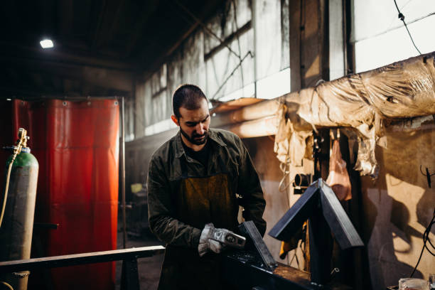 istock Welder working in a factory 1306681870