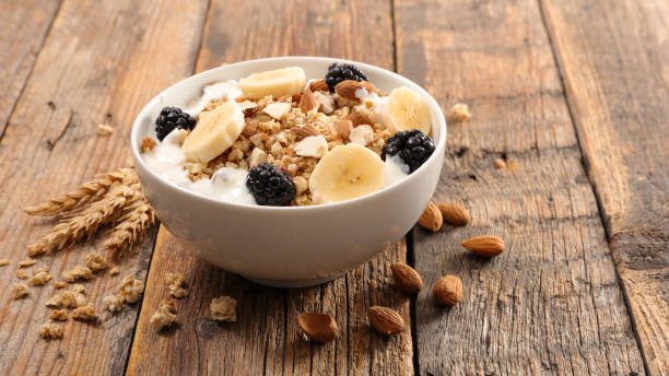 istock bowl of granola, yogurt and fruit 1306684113