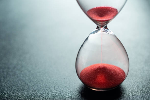 istock Sand glass, modern hourglass showing last second or last minute or time out. With copy space. 1306684337