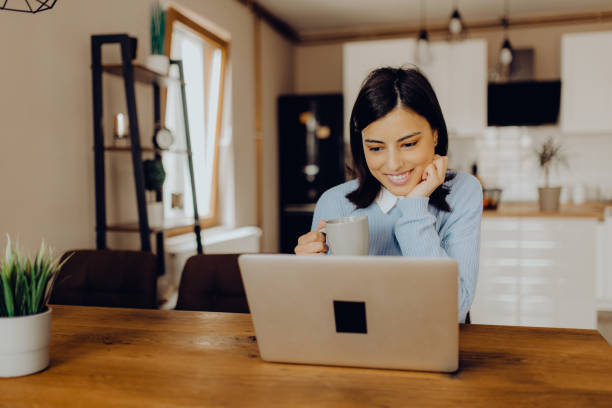 istock young woman having a video call with her friends 1306684510
