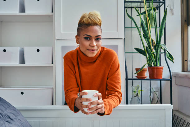 istock Happy Female Hipster Having Coffee At Home 1306687242