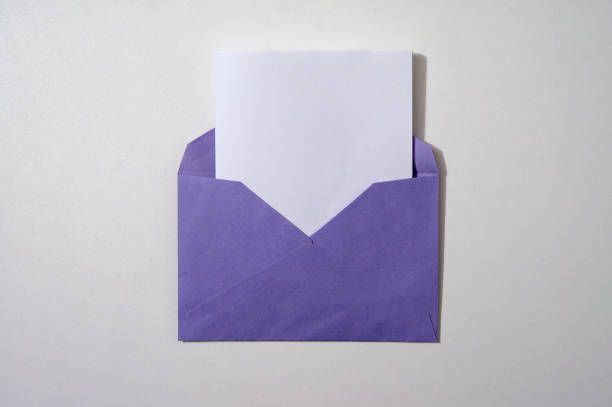 istock Close-up colorful mail envelope on white background 1306691761