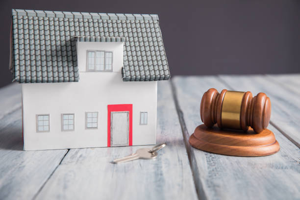 istock house model with judge gavel 1306692518