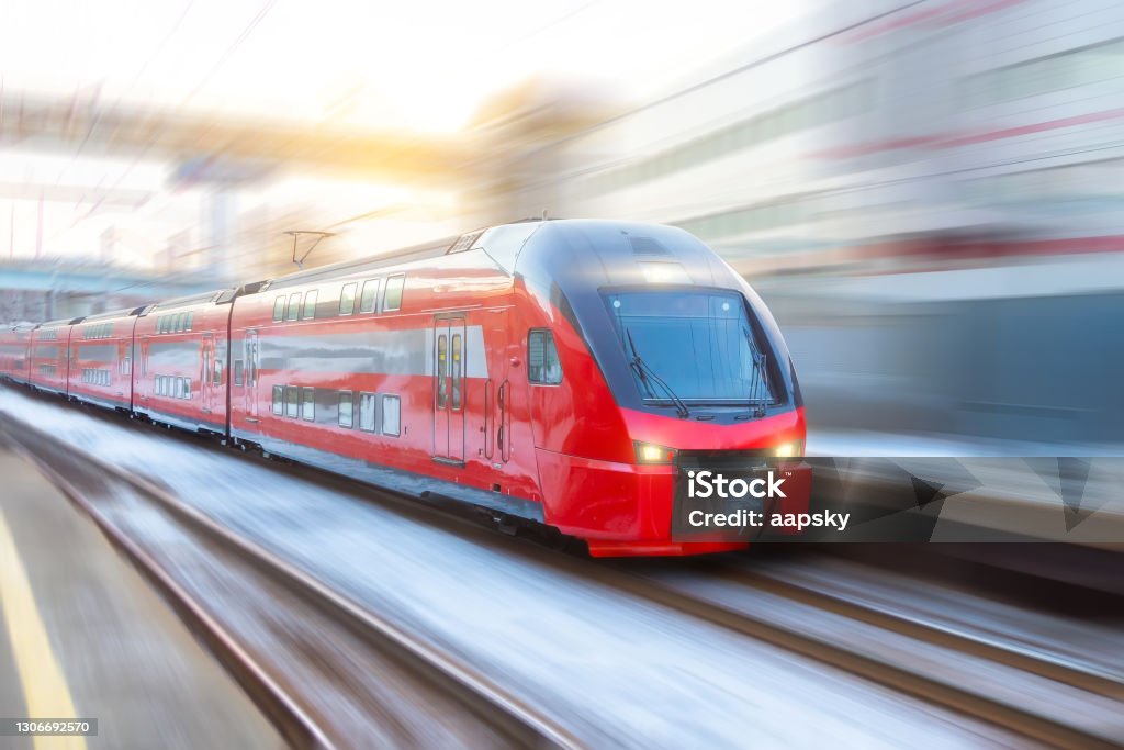 Speed Double Decker Express Train Arrives At A Station In The City Stock  Photo - Download Image Now - iStock