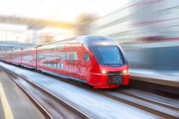 speed double decker express train arrives at a station in the city. - high speed train imagens e fotografias de stock