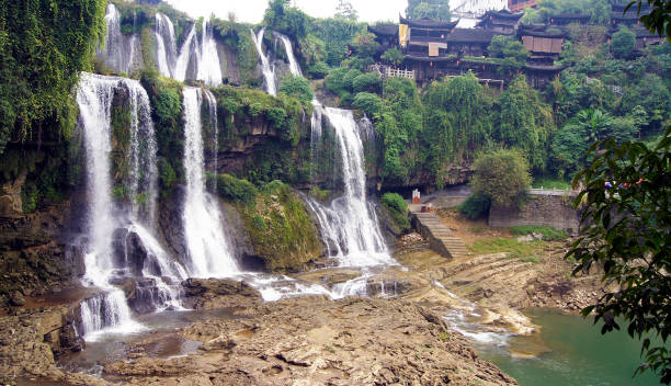 istock Waterfall that crosses furong village - China 1306694172