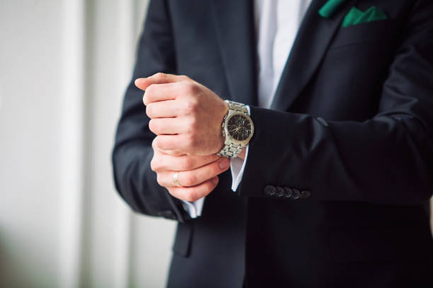 istock The man in the window wears watches 1306695997
