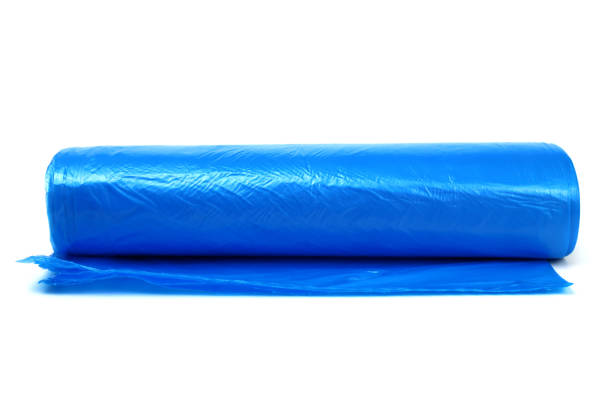istock Roll of garbage bags isolated on white 1306696968