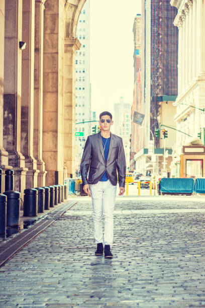 istock Young Asian American Man traveling in New York 1306700708