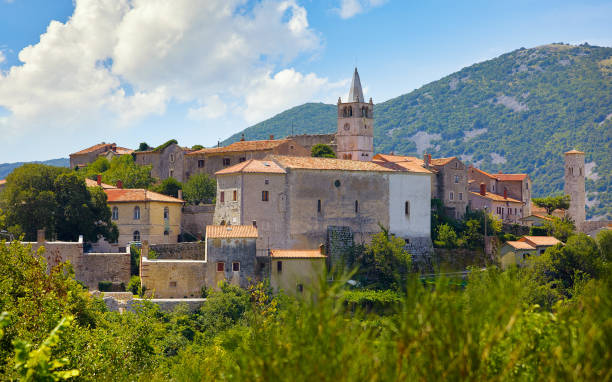 istock Plomin Croatia. View at old medieval town. Vector illustration. Illustrative editorial use only. 1306706695