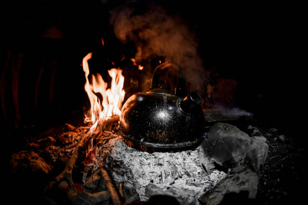 istock iron kettle stands on the coals of fire 1306707724