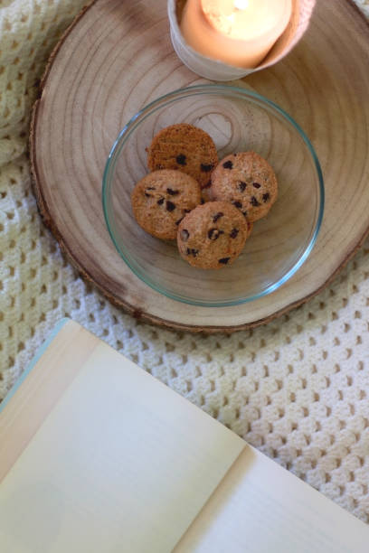 istock Cookies, Candle and Book 1306711253