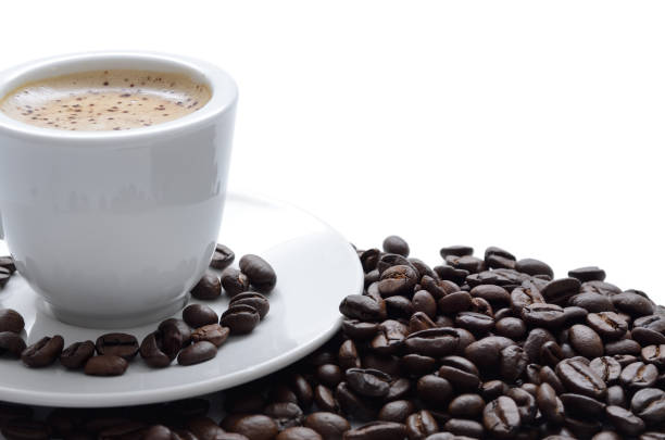 istock Aromatic coffee in a cup, coffee beans isolated on white 1306714571