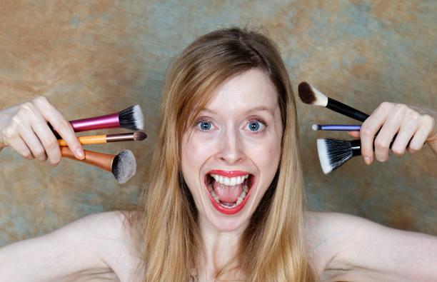 istock Woman screaming for makeup 1306716054