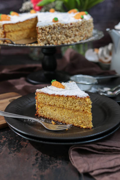 Carrot Cake in rustic barn kitchen with spring tulips for easter brunch