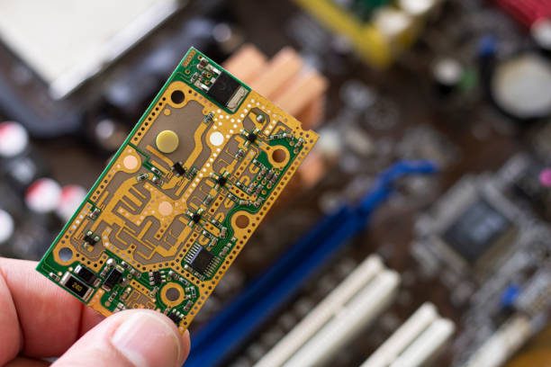 istock Close-up on electronic circuit with blurred background, very short depth of field 1306720690