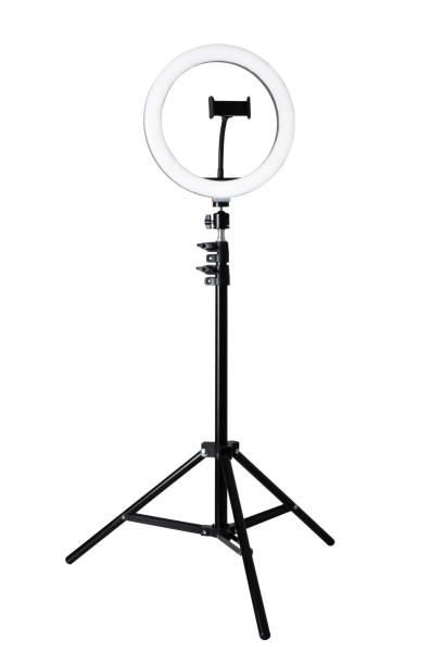 Selfie ring light LED lamp on the tripod for smart phone with clipping path Selfie ring light LED lamp on the tripod for smart phone isolated on the white background with clipping path tripod stock pictures, royalty-free photos & images