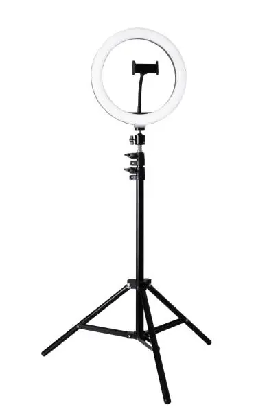 Selfie ring light LED lamp on the tripod for smart phone isolated on the white background with clipping path