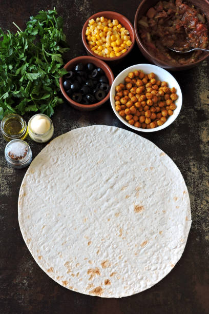 istock Pita bread and a filling for burritos. 1306729281
