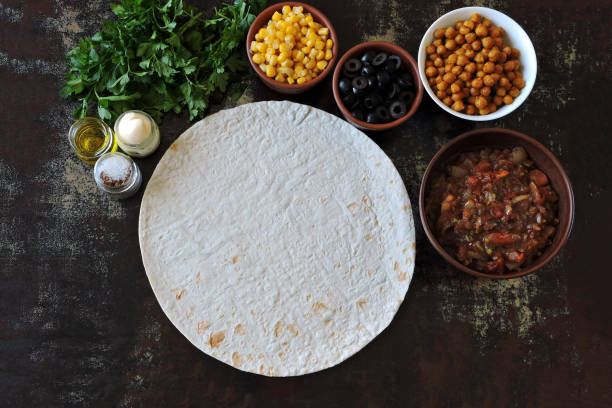 istock Pita bread and a filling for burritos. 1306729287