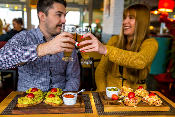 istock Couple toasting with beer 1306731754