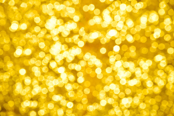 istock Abstract Defocused Golden Lights Background 1306734216