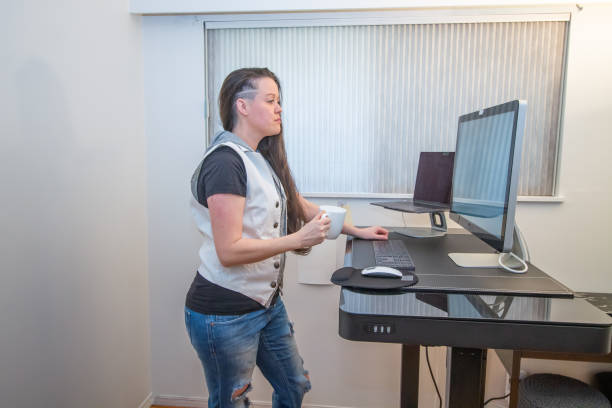 istock woman working from home at her ergonomic desk 1306734354