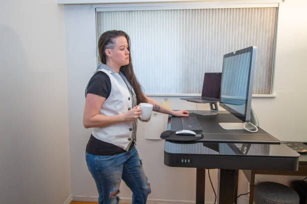 istock woman working from home at her ergonomic desk 1306734371