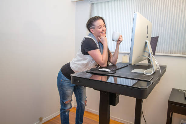 istock woman working from home at her ergonomic desk 1306734408