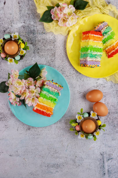 istock Top view of Easter dessert colorful cake with sprinkles and eggs. 1306739934