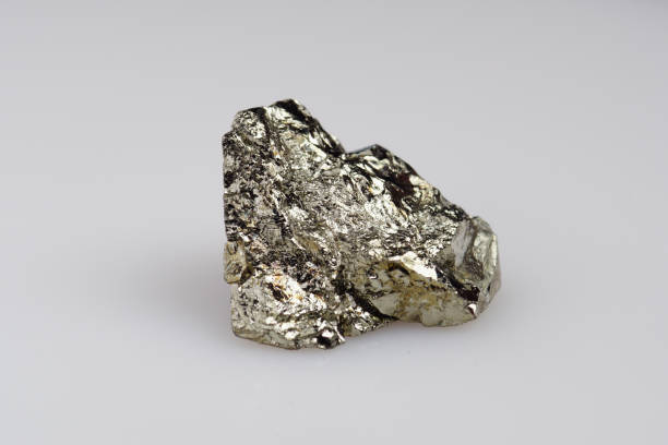 istock Natural pyrite on white background 1306749360
