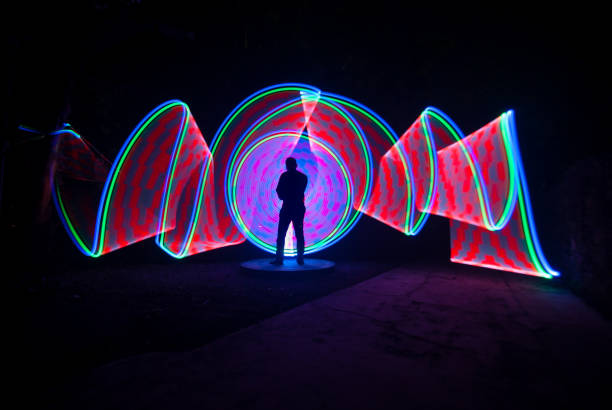 istock People with beautiful light painting artwork 1306750651