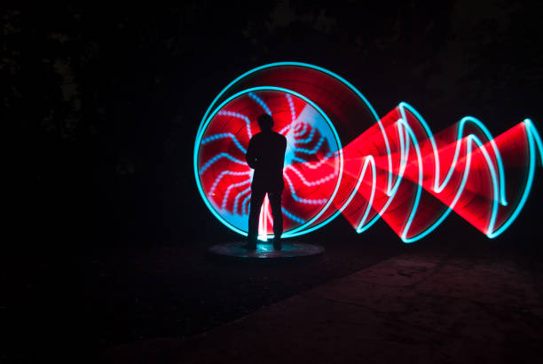 istock People with beautiful light painting artwork 1306750836